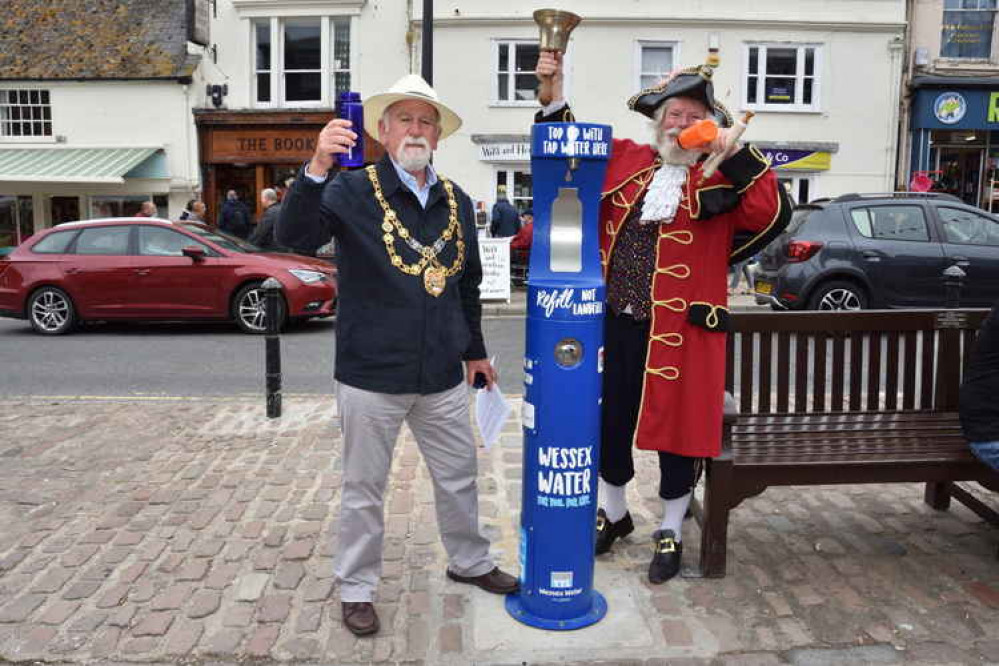 Bridport mayor, councillor Ian Bark, and town crier John Collingwood open the new water fountain Picture: Tim Russ