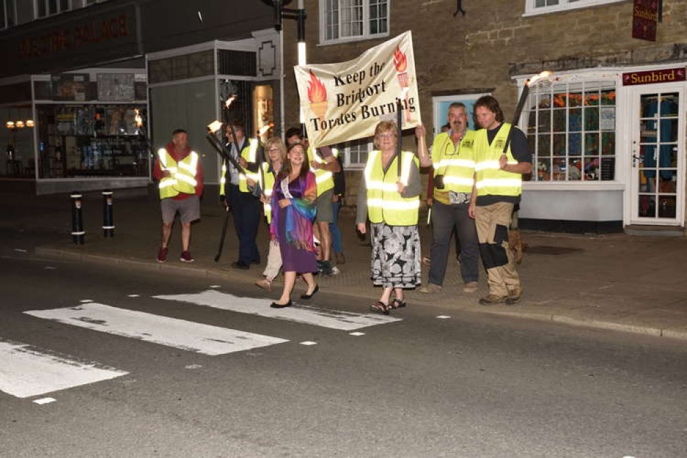 Bridport Carnival Committee and carnival princess walking the torchlight route Picture: Tim Russ