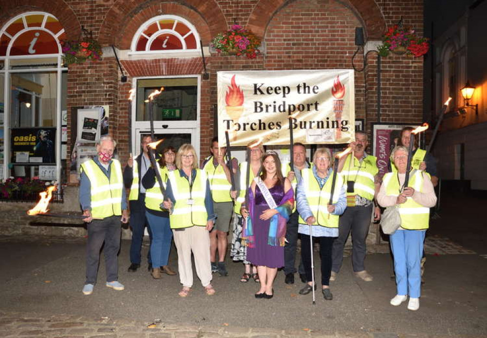 Members of Bridport Carnival Committee and carnival princess walked to torchlight procession route to raise awareness Picture: Tim Russ