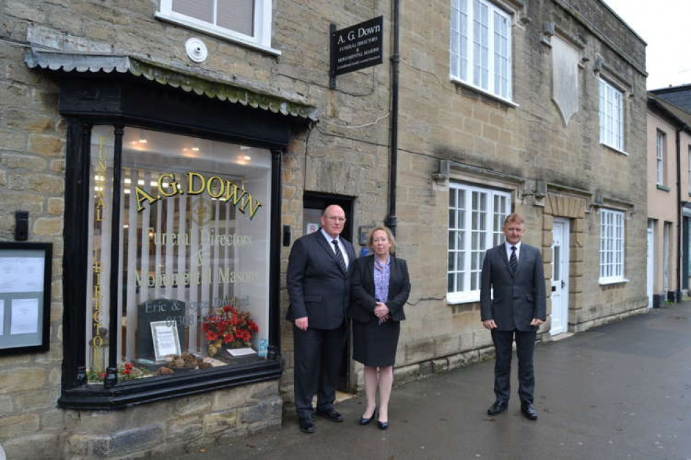 Bridport funeral directors A. G. Down supports the Royal British Legion, pictured are Julian and Karen Hussey with Darren Holt of A. G. Down