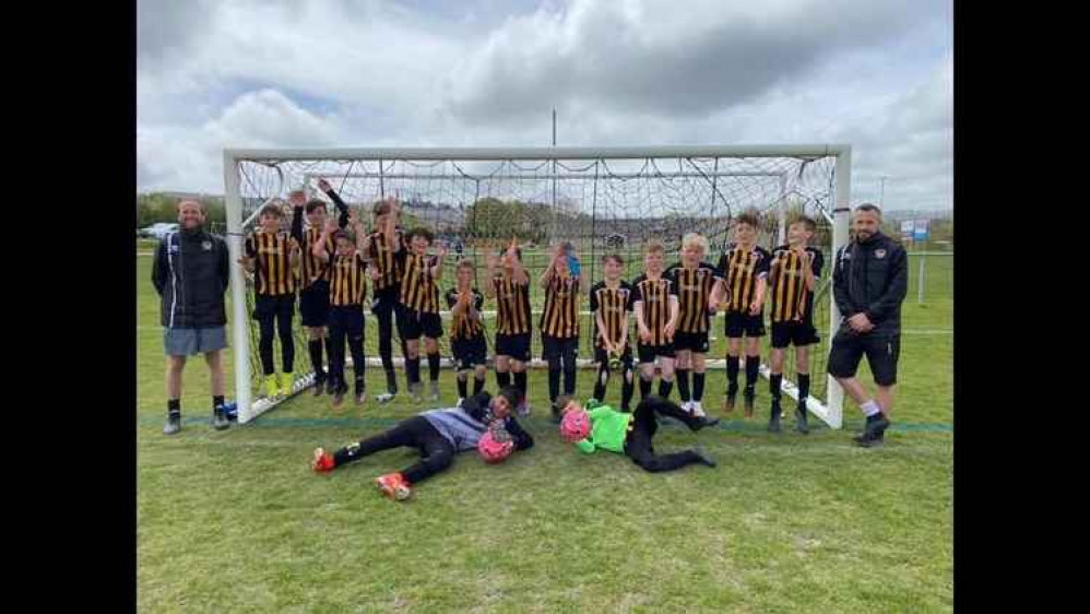 Axminster Town Under 12s celebrate winning a place in the final of the High Holborne Cup Axminster Town Under 12s celebrate winning a place in the final of the High Holborne Cup