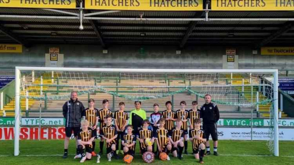 Axminster Town Under 12s line-up before their cup final at hush Park, the home to Yeovil Town Axminster Town Under 12s line-up before their cup final at hush Park, the home to Yeovil Town