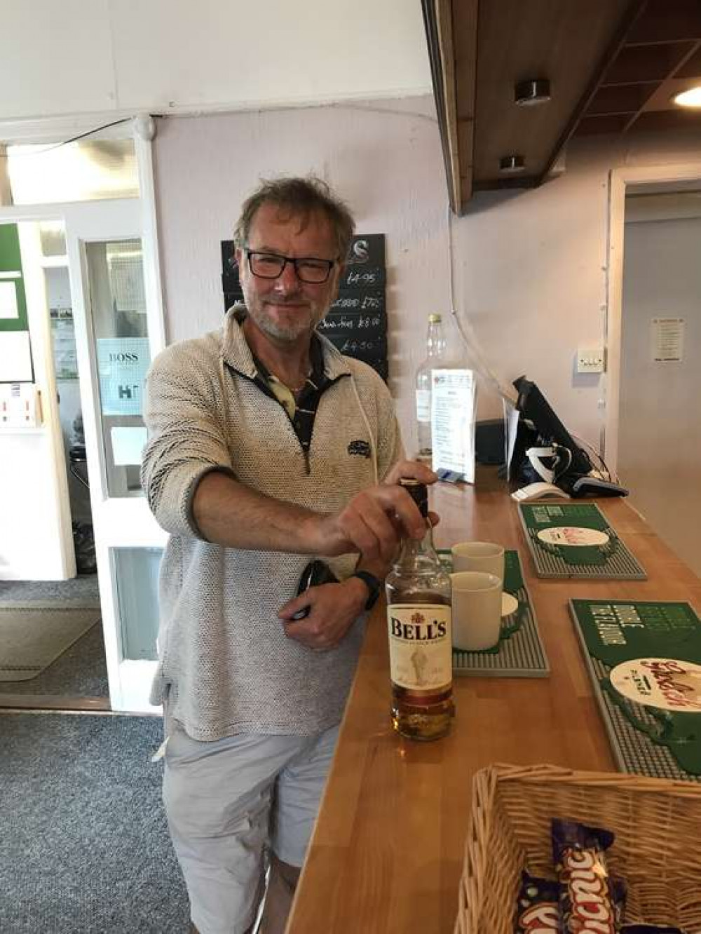 New member Andrea Bailey celebrates his hole-in-one at Axe Cliff Golf Club's tricky par 3 11th