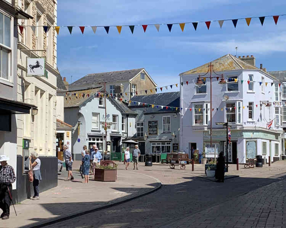 Seaton residents adhering to social distancing as they wait to do their banking