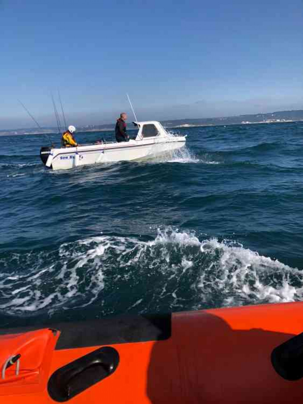 A lifeboat crew member aboard the struggling fishing boat (photo by Andy Butterfield)