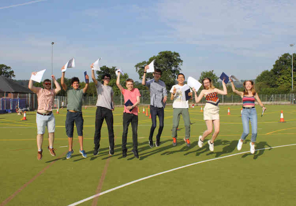 A-level students from Colyton Grammar School, who received their results on the school's astro turf to enable safe social distancing.