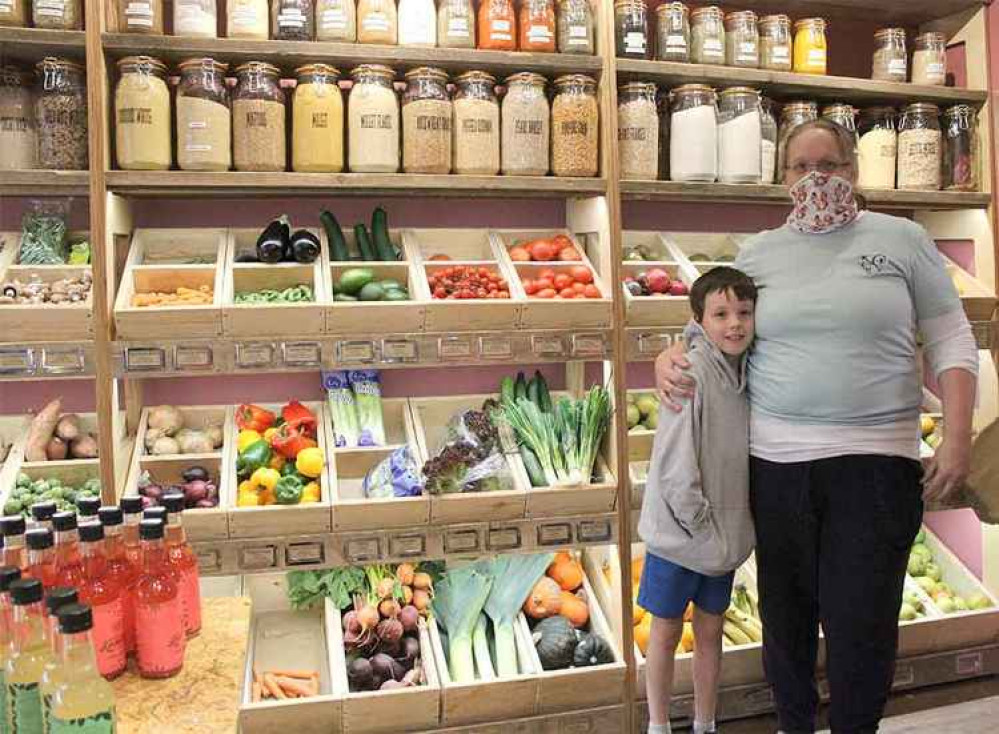 Paula Smith and her son pictured in the Squirrel fruit and veg shop