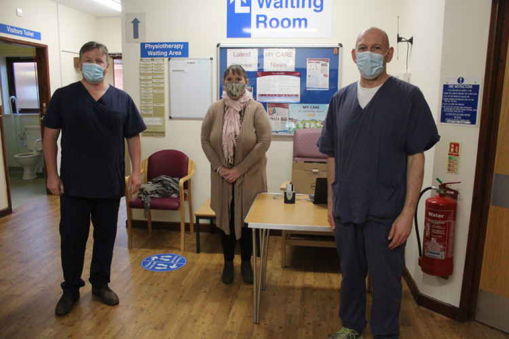 Dr Rob Daniels (left) and practice manager Elly Porter from Townsend House Medical Centre in Seaton, and Dr John Twaddle (right) from Seaton & Colyton Medical Practice on the first day of vaccinations