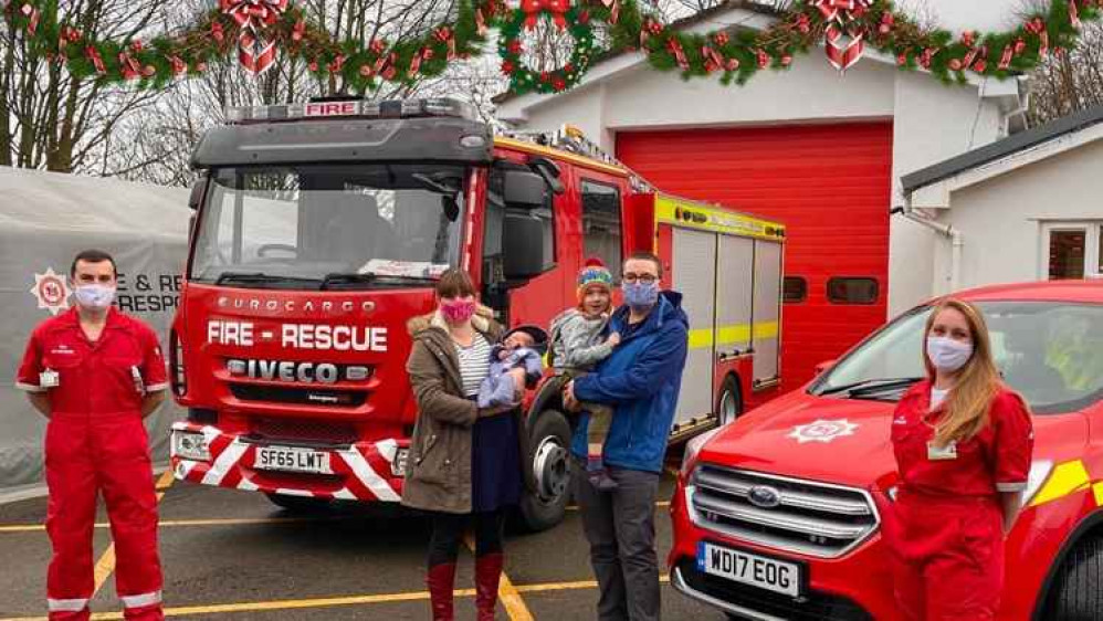 The Seaton fire first responders and the Walker family with new baby Harry