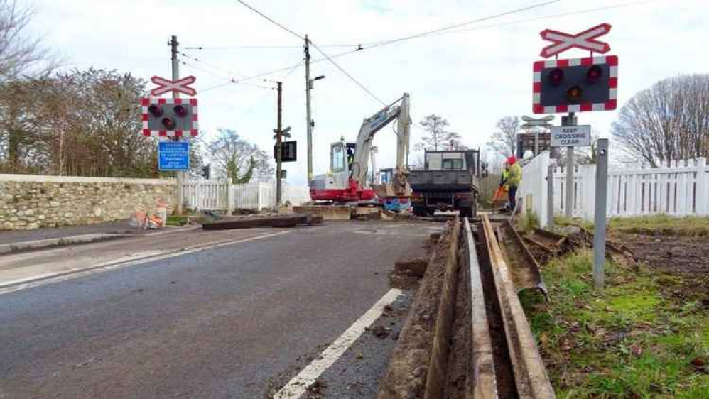 The tram tracks and foundations are currently being replaced at the Colyford level crossing (photo by John Vieth)