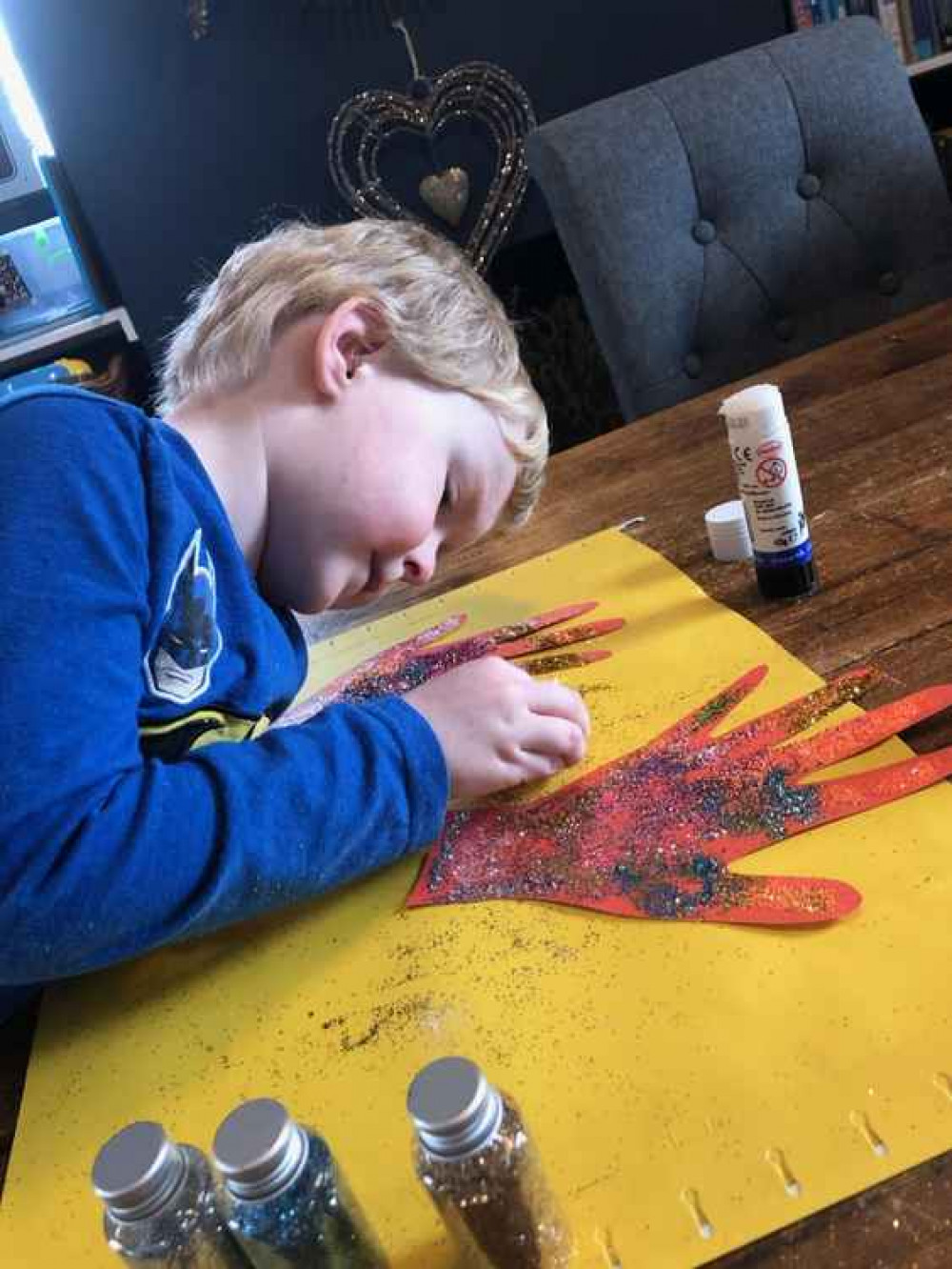 Families have been making hands to display in their windows as a virtual wave to passers by