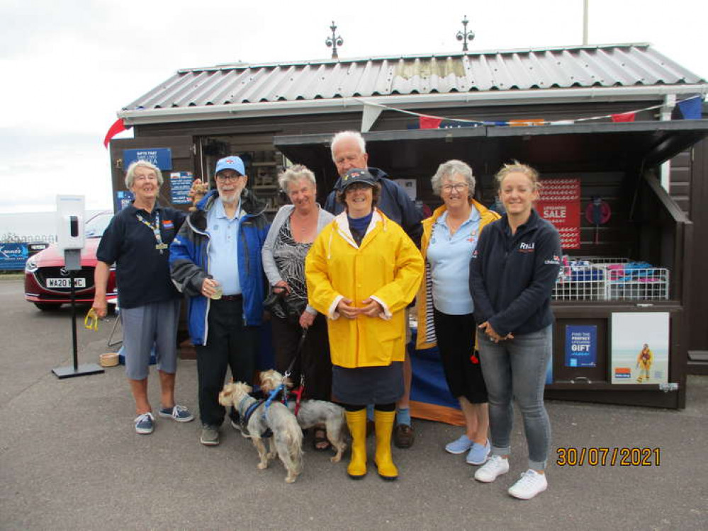 RNLI volunteers at the reopening of the charity shop in Beer
