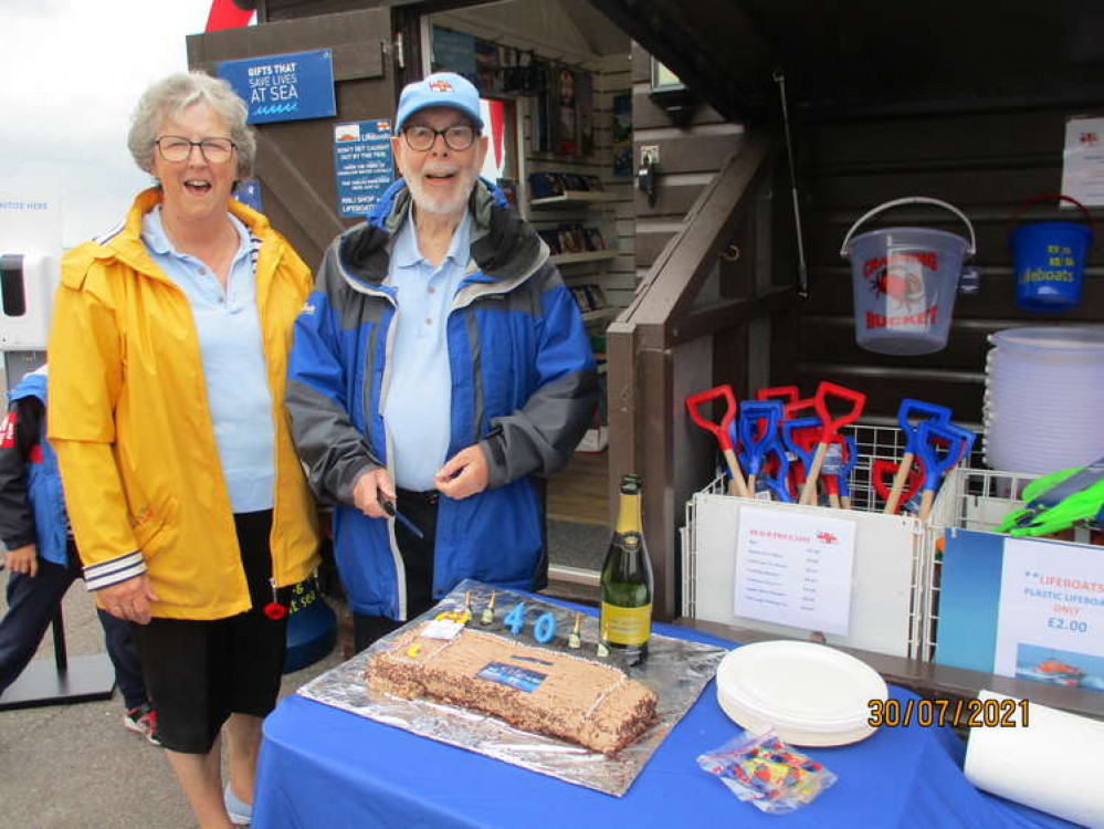 Volunteers with the 40th anniversary cake