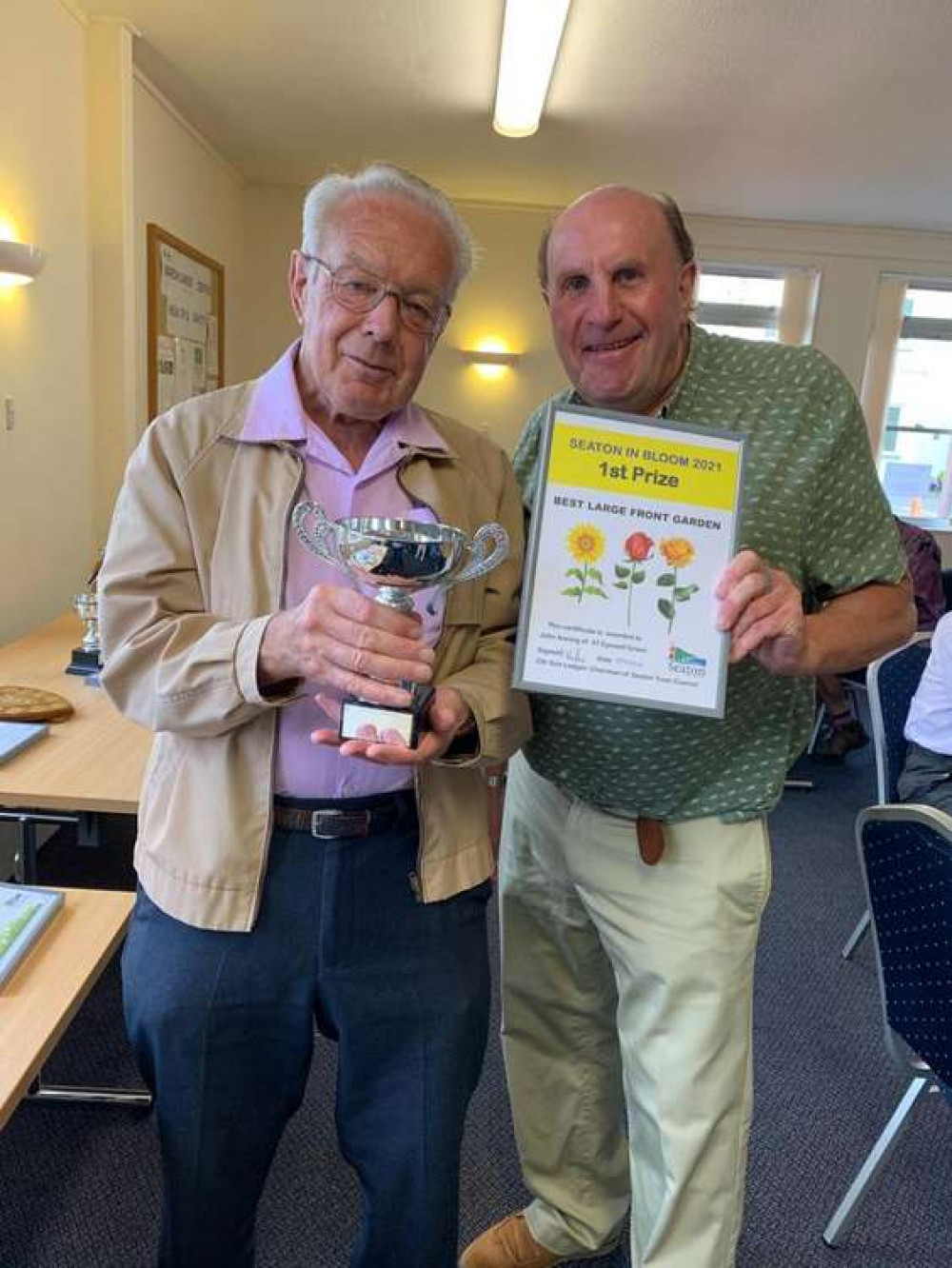 John Anning receives the prize for best large front garden John Anning receives the prize for best large front garden