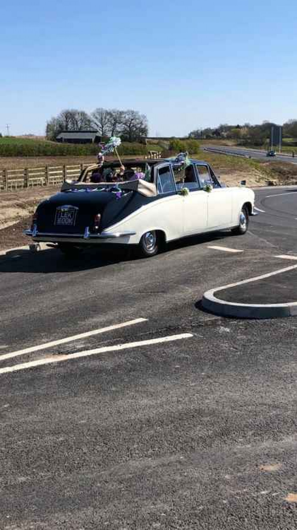Members of Elizabeth's Group in a classic Daimler car. Members of Elizabeth's Group in a classic Daimler car.