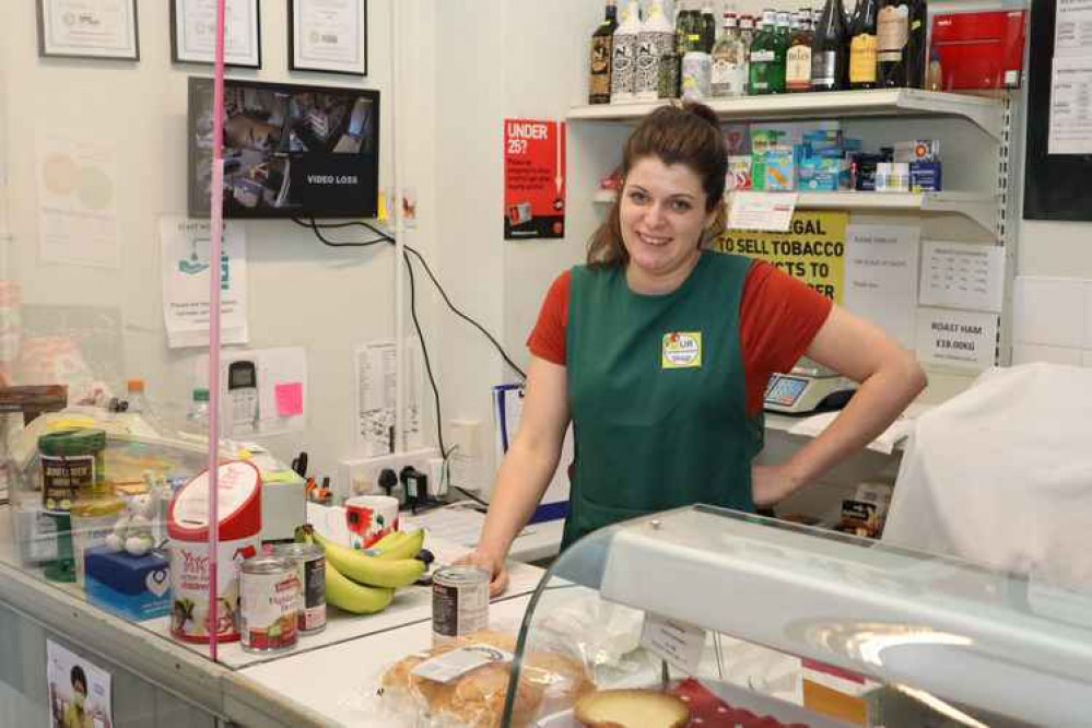 Volunteer Molly Ross (28), joined Gawsworth Shop after being furloughed by her employer. Despite since returning to full-time work, she still volunteers at the shop because she enjoys contributing to the community. (Credit - Gawsworth Hub)