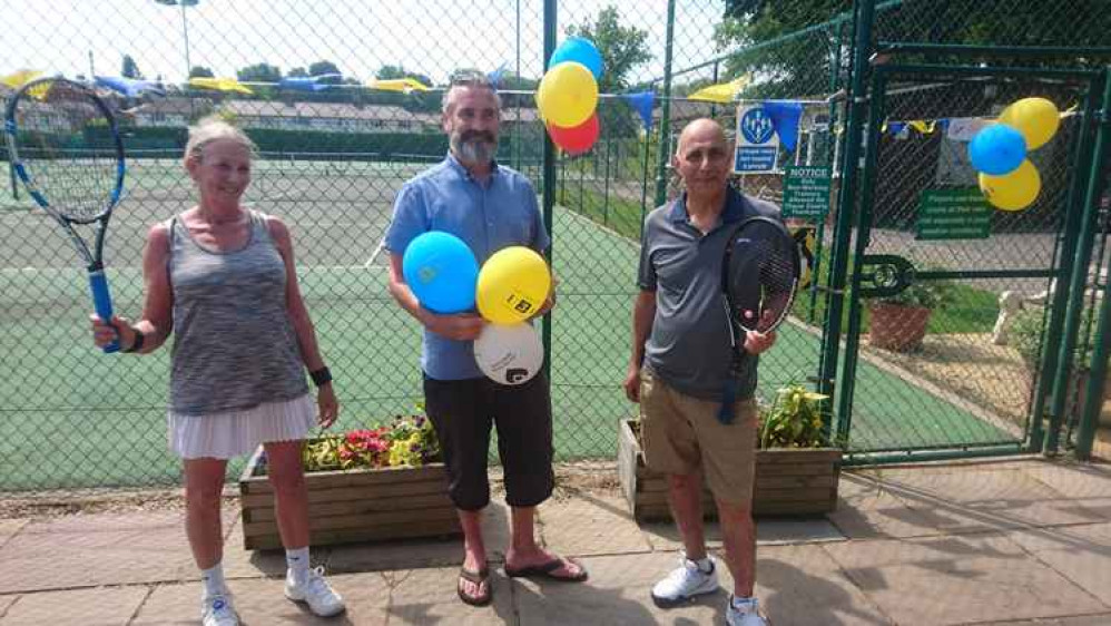 Winners Judy Lea and Reza Sedarati with chair Rob McNinch.