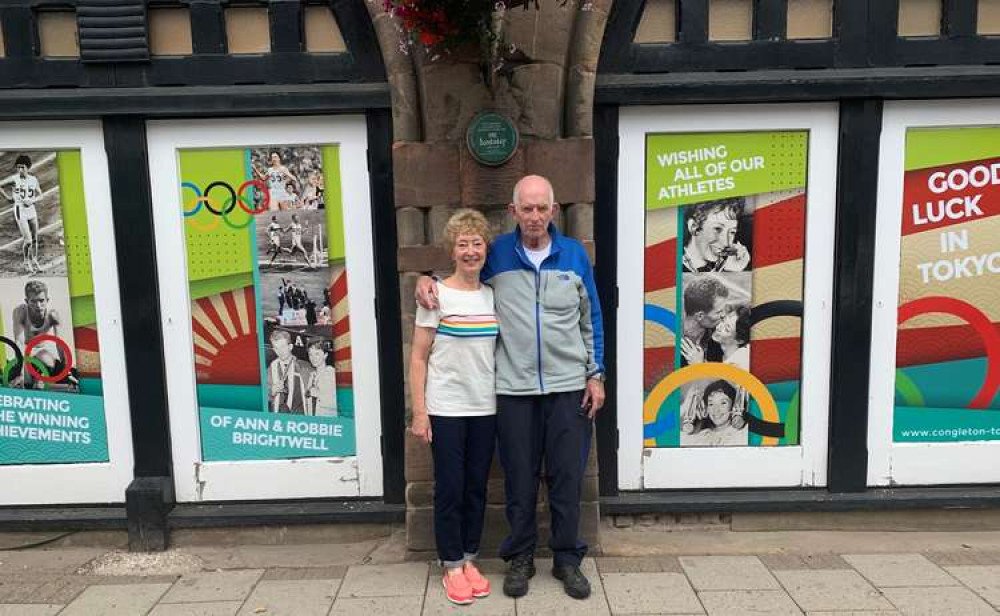 Congleton residents, Robbie and Ann Brightwell (formerly Ann Packer) are delighted with the town hall window displays to commemorate their Olympic achievements at Tokyo 1964.