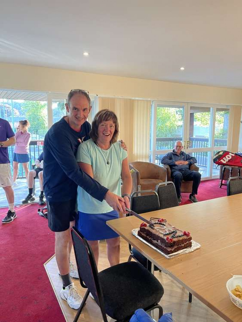 Nick and Claire cutting their anniversary cake. A good afternoons tennis was had by all.