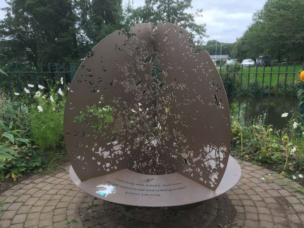 Standing amongst the shoulders of giants: The 2021 Green Flag Award winners has a bench featuring a quote from 1921 Nobel Prize winner Albert Einstein.