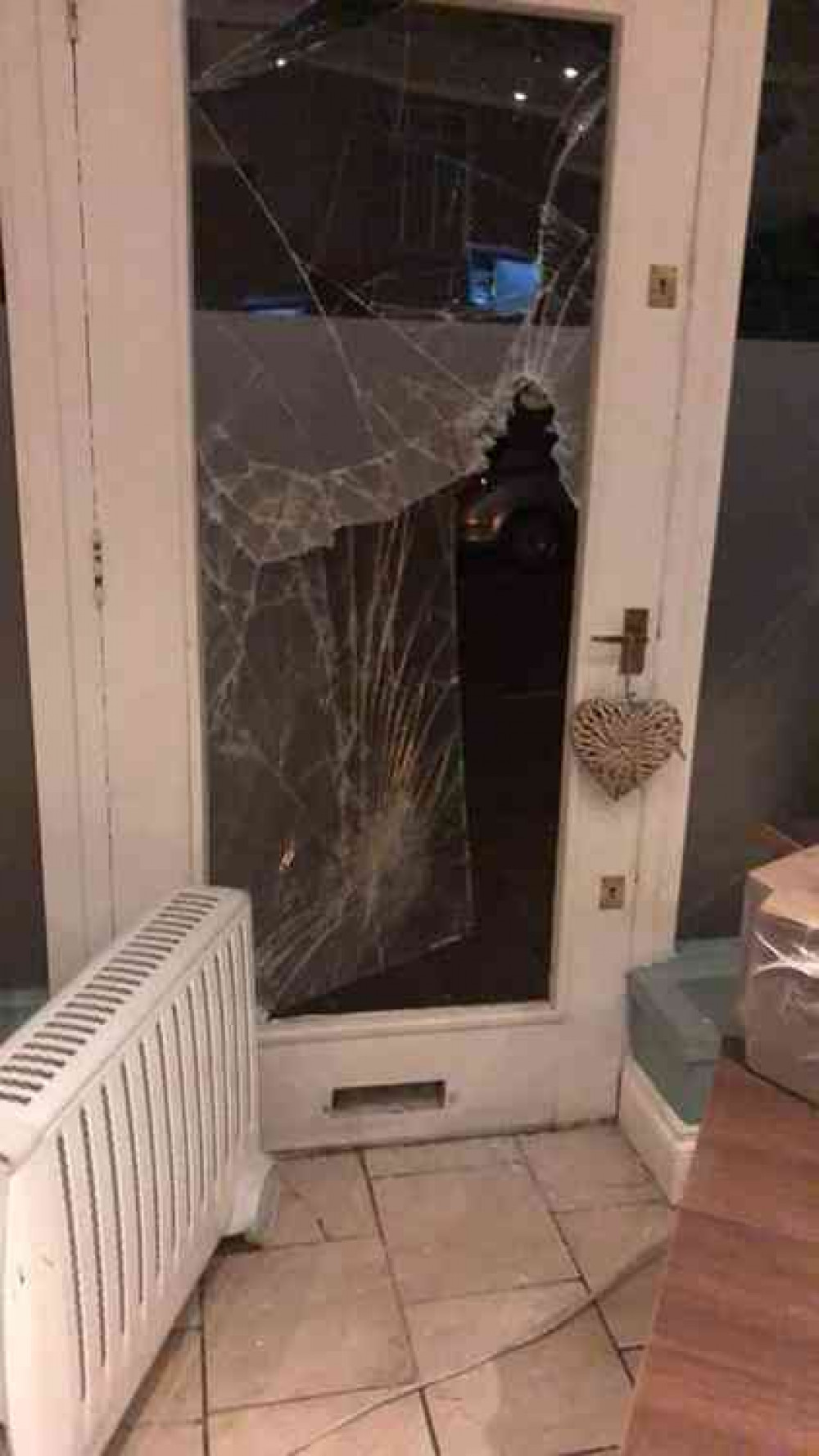 The front door window was also smashed through.