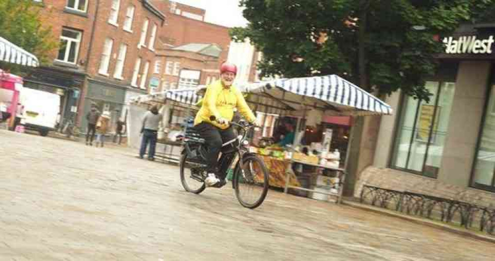 Deputy mayor Cllr David Edwardes had a go at cycling in the town centre (image: Max Edwardes)