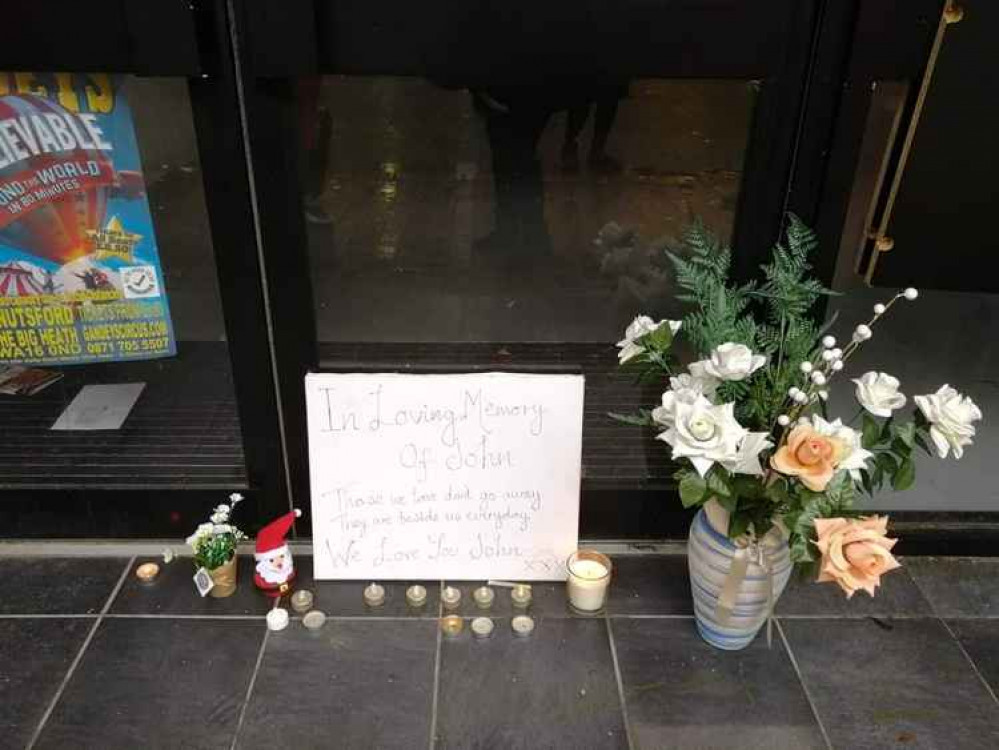 Tribute left for John on Mill Street.