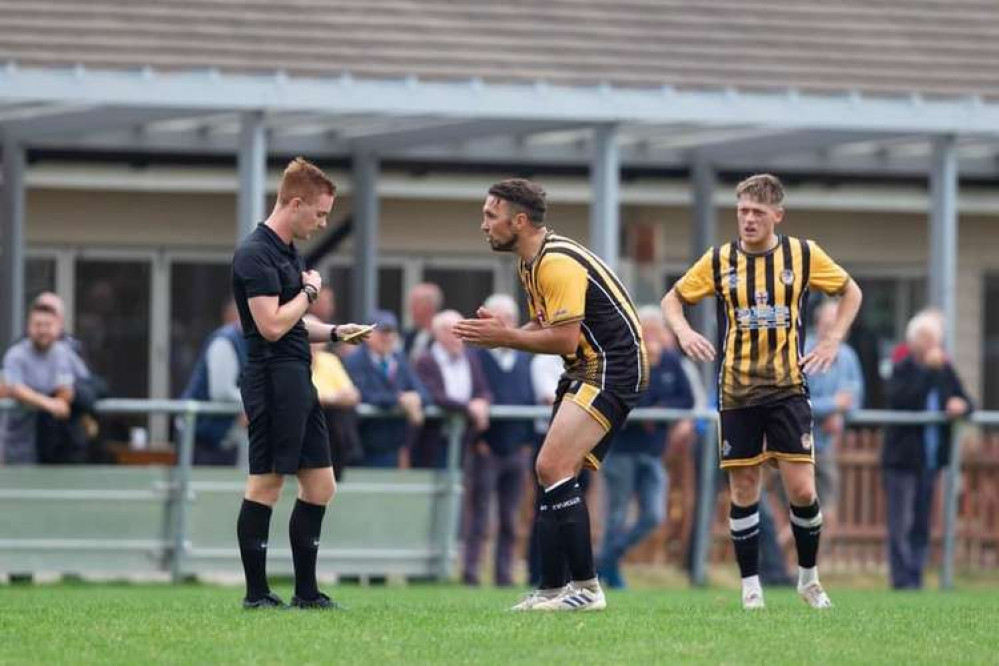 NEVER REF! Jamie Price is booked in Axminster Town's FA Vase 1-0 defeat against Brixham AFC NEVER REF! Jamie Price is booked in Axminster Town's FA Vase 1-0 defeat against Brixham AFC