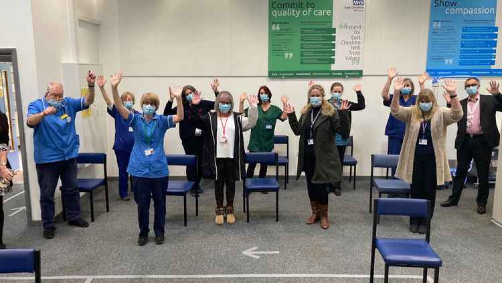 A socially-distanced celebration for the 11 Macclesfield Hospital vaccination staff. (Image - East Cheshire NHS Trust)