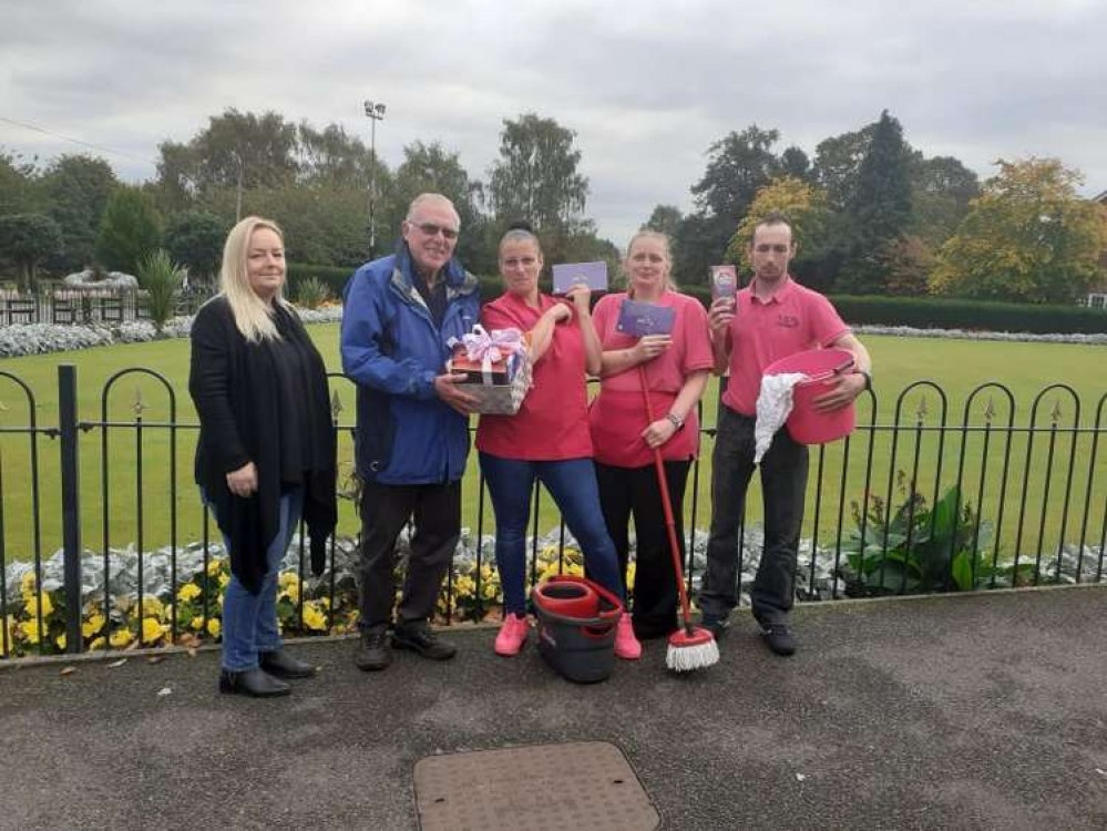 Sandbach Partnership and the Friends of Sandbach Park present a hamper to Heidi Weaver and staff