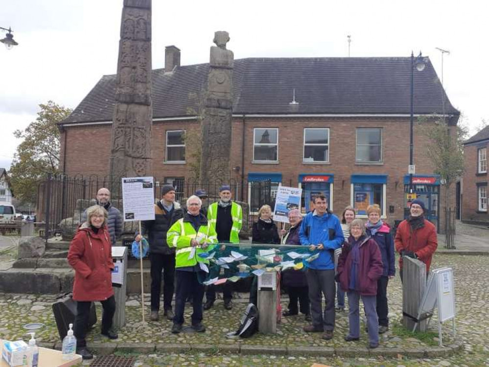 Campaigners with the boats at Saturday's vigil