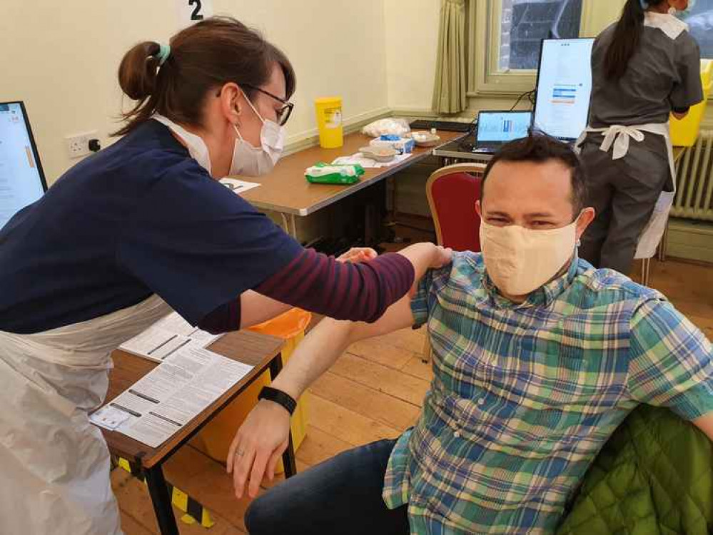 Councillor Gary Malcolm getting vaccinated at Ealing Town Hall