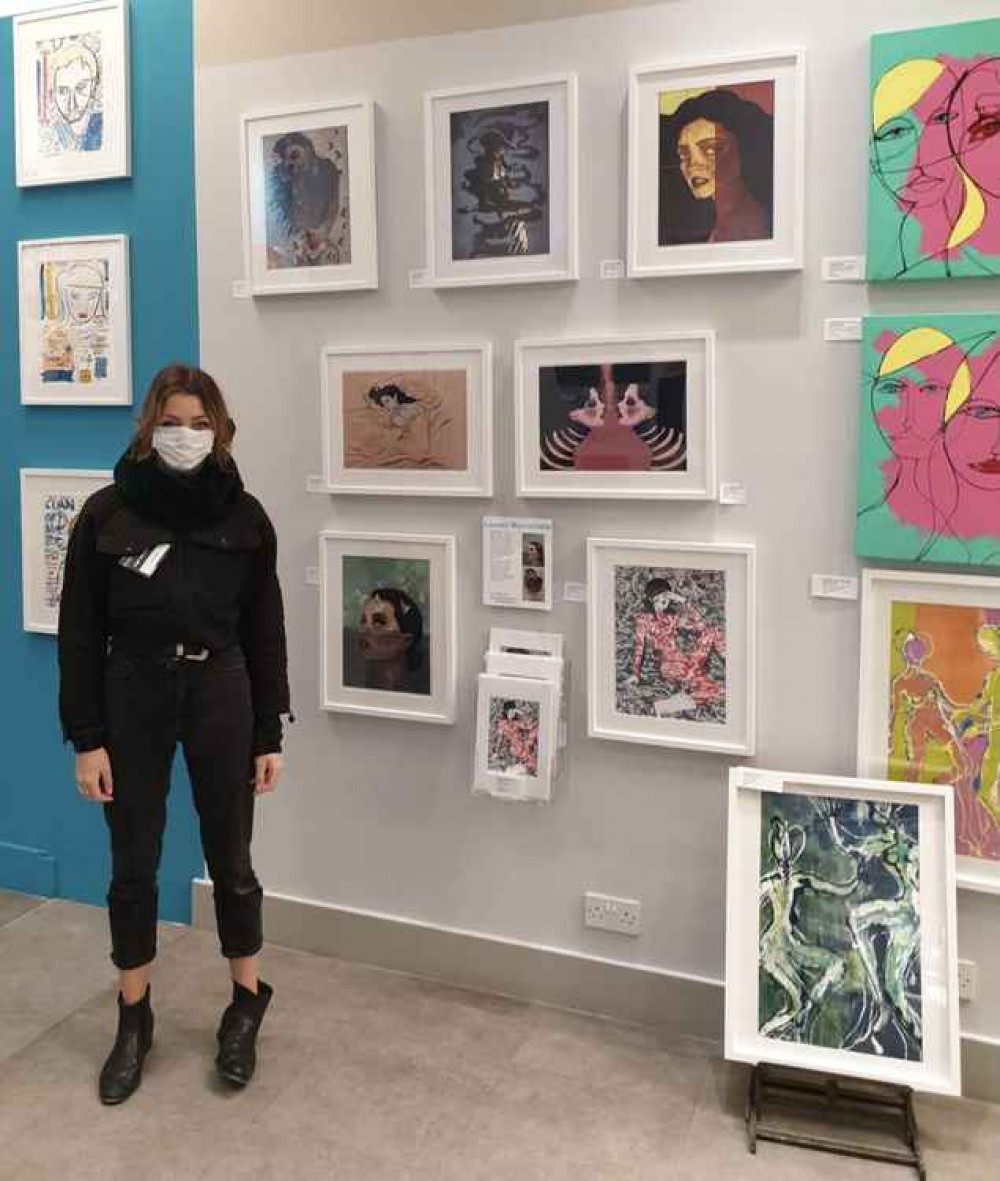 Lauren Mavromatis in front of her work at the Pop Up Gallery Lauren Mavromatis in front of her work at the Pop Up Gallery