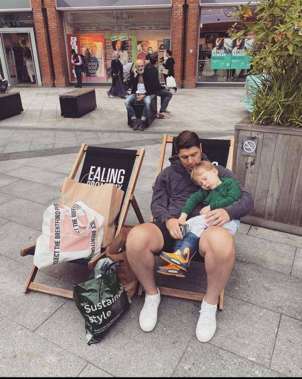 Paul Leslie and his son Rafferty relaxing on the deckchairs. Image Credit: Leslie & Co