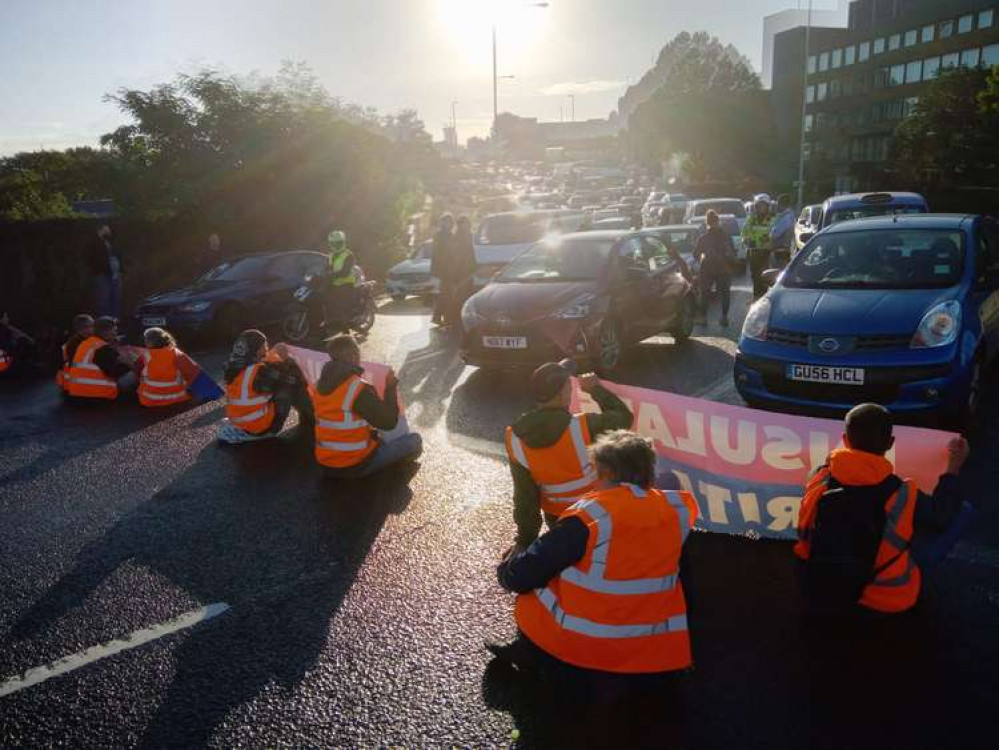 Blackwall Tunnel, Hanger Lane and Wandsworth Bridge were blocked. (Image: Insulate Britain)