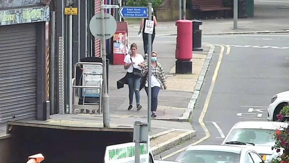 The woman withdrew £300 on Long Lane, Hillingdon on Tuesday, 13 July. (Image: Metropolitan Police)