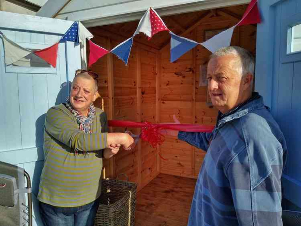 Karen and Nigel Ball open the beach hut at Lyme Regis especially for cancer sufferers