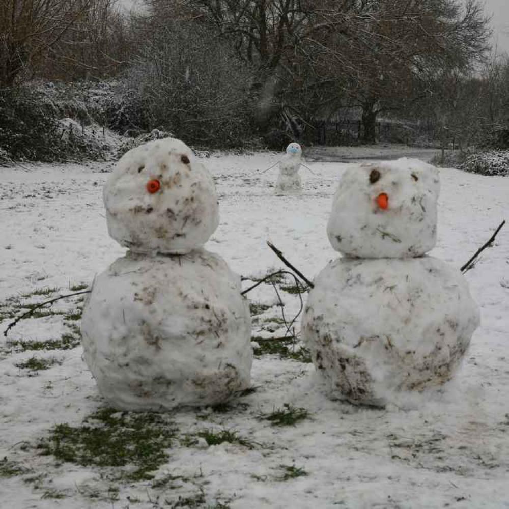 The snow people of Crane Park by John Royle