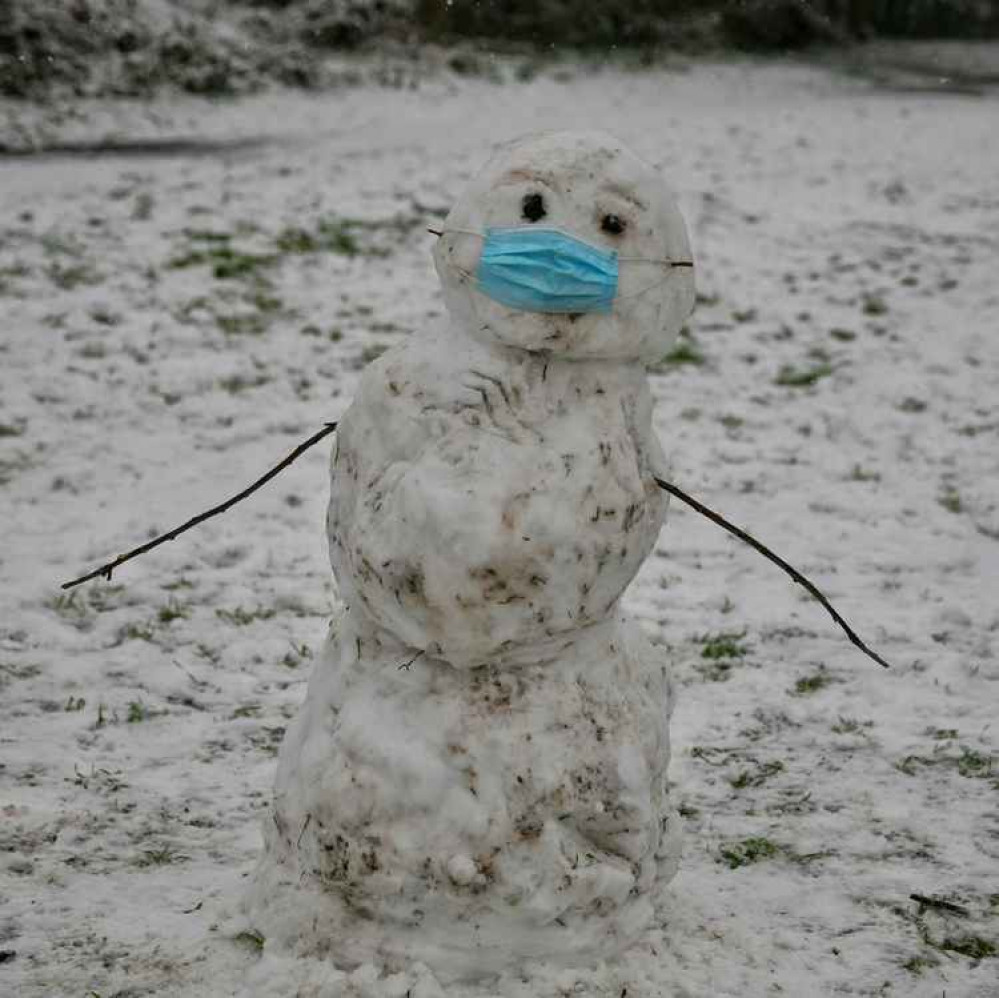 The snow people of Crane Park by John Royle