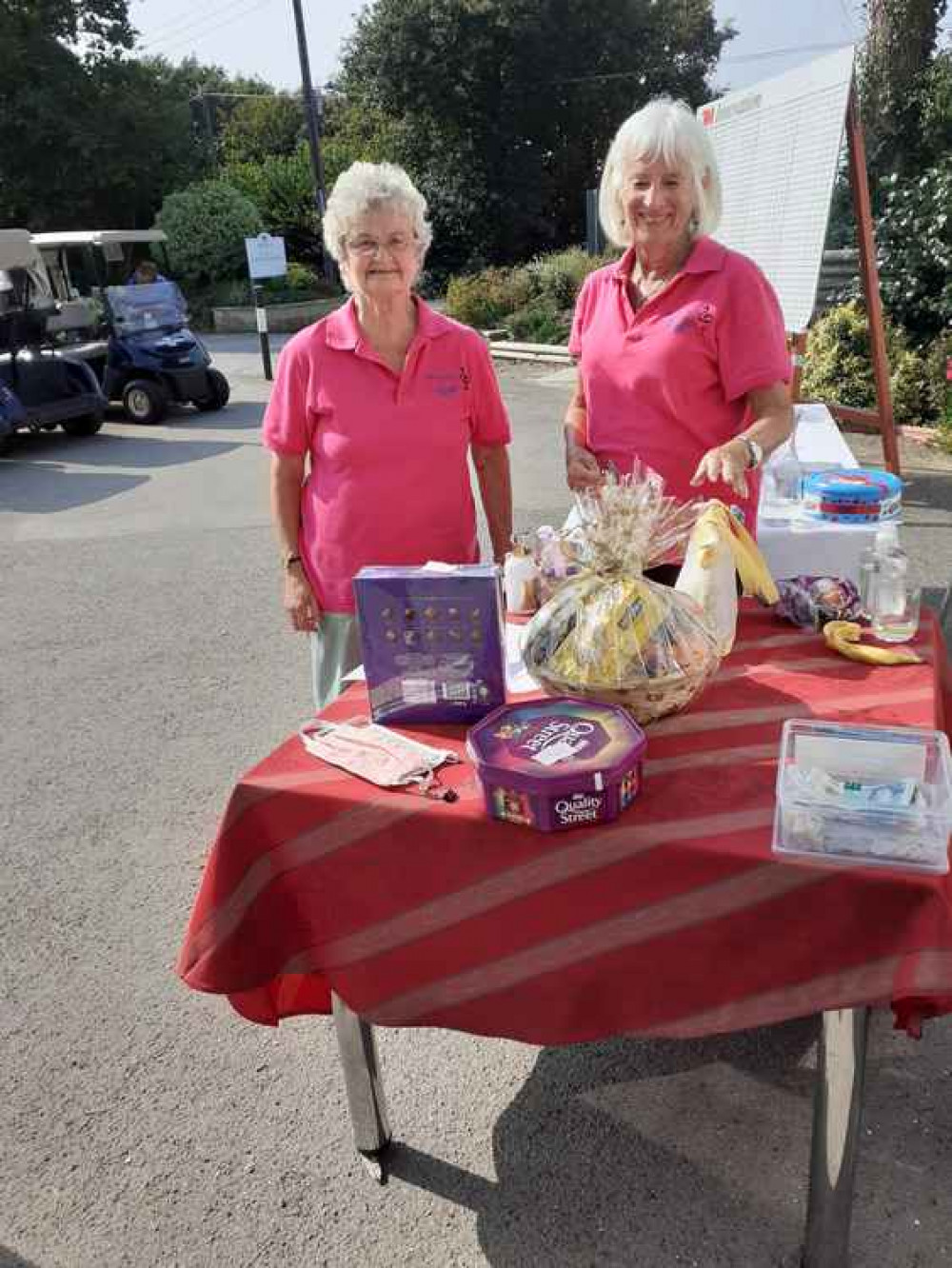 Running the raffle stall at the Flamingo Pools charity golf day at Lyme Regis Golf Club