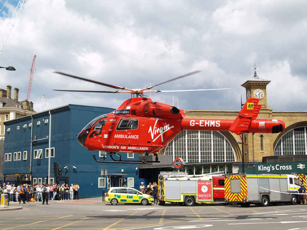 The London air Ambulance lands at Kings Cross Underground station in support with the Fire and road Ambulance service attending an incident, to air lift a patient to Royal London Hospital, 2009 (Image: Simon Lamrock)