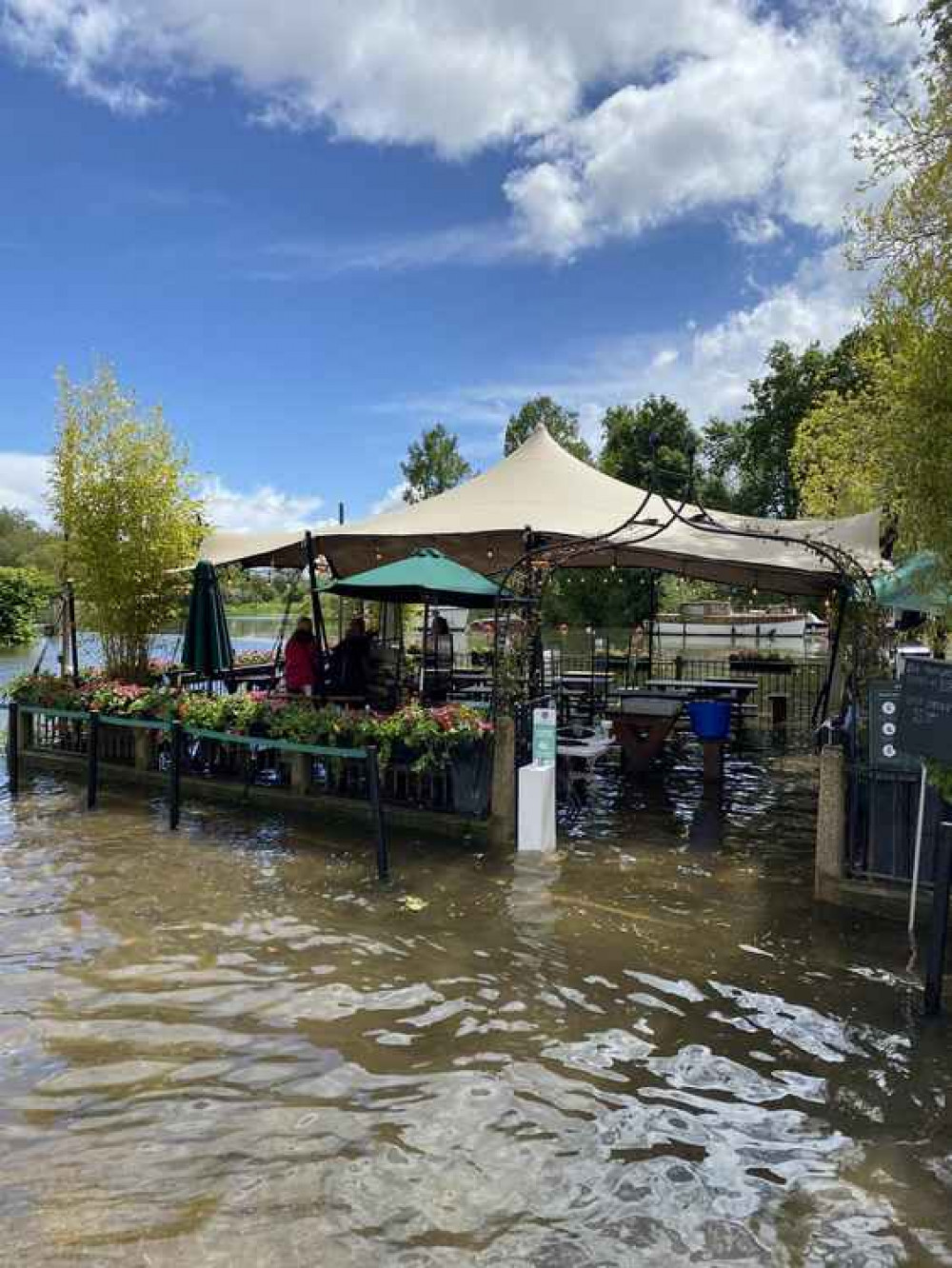 The jetty garden at The White Swan flooded earlier in the week (Image: The White Swan)