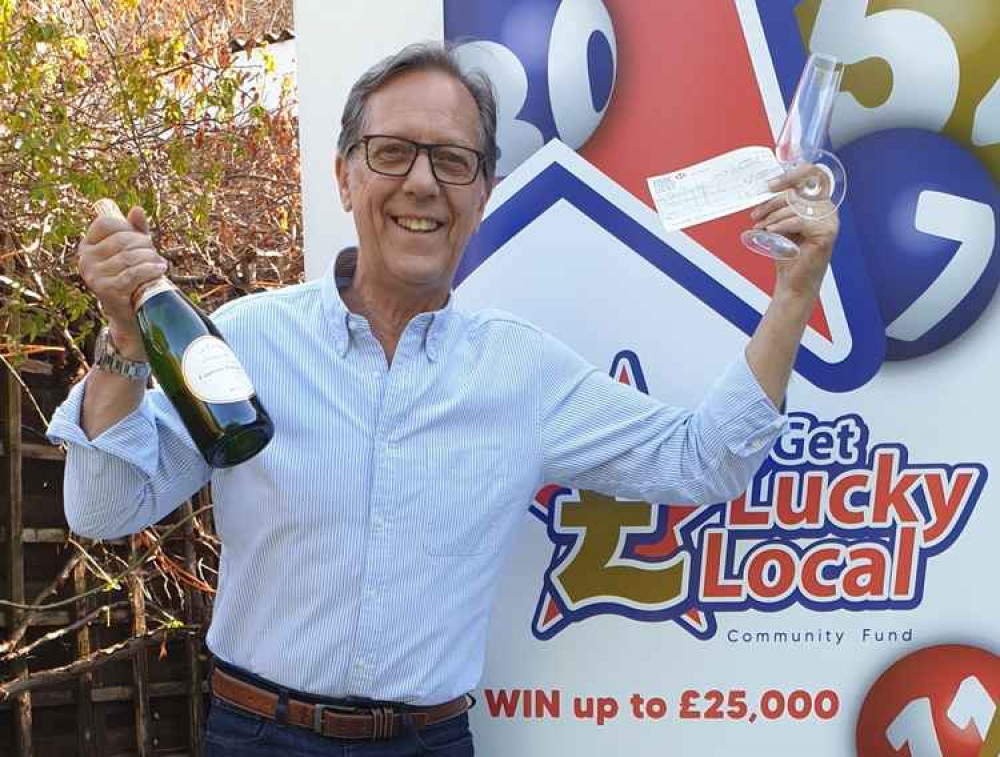 Crack open the Champers! Paul Shields celebrating after his £2000 Get Lucky Local lottery win