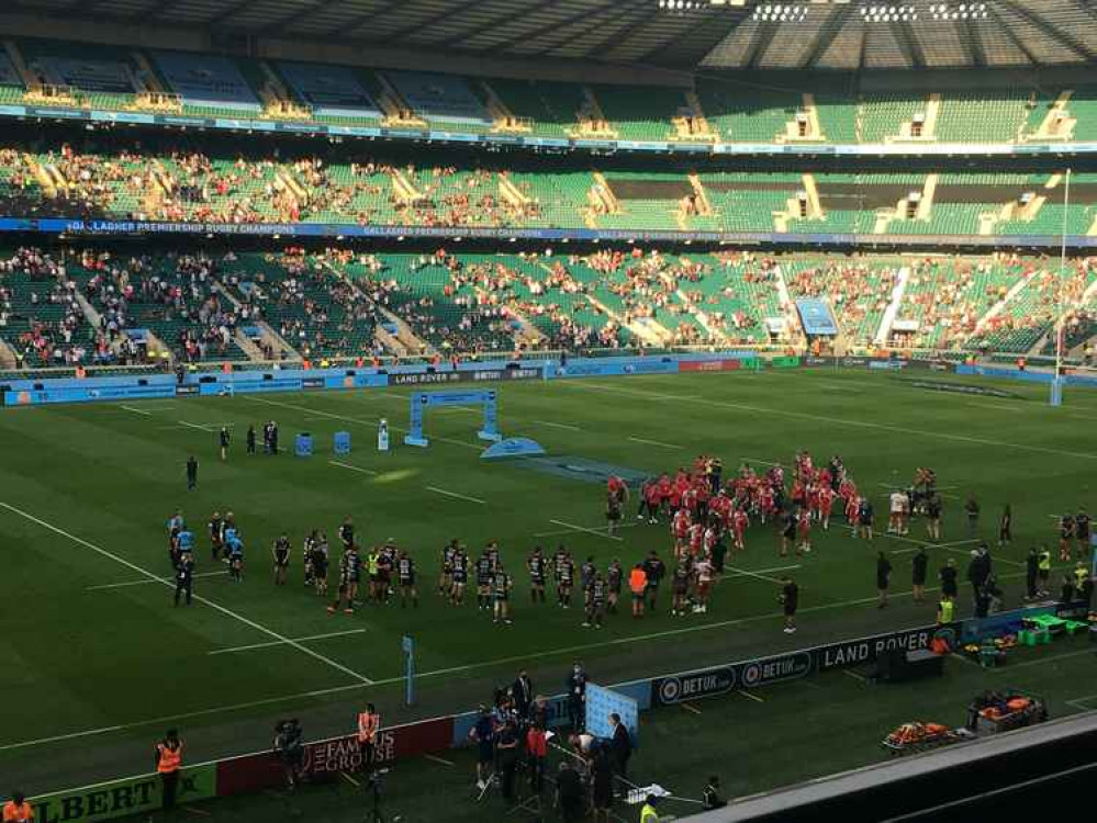 Quins celebrate after the game