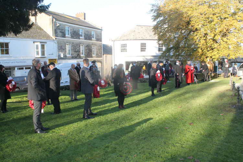 Wreath layers line up on The Minster Green before the start of Axminster's Remembrance service. Scroll through the gallery for more photographs