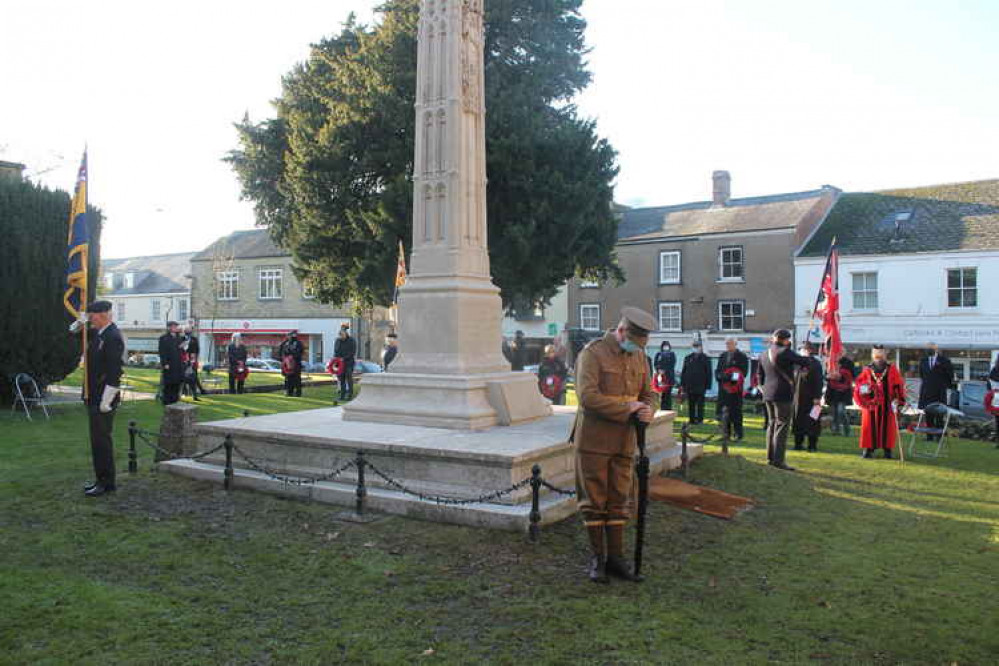 Heads bowed at the war memorial on The Minster Green during the two minutes silence