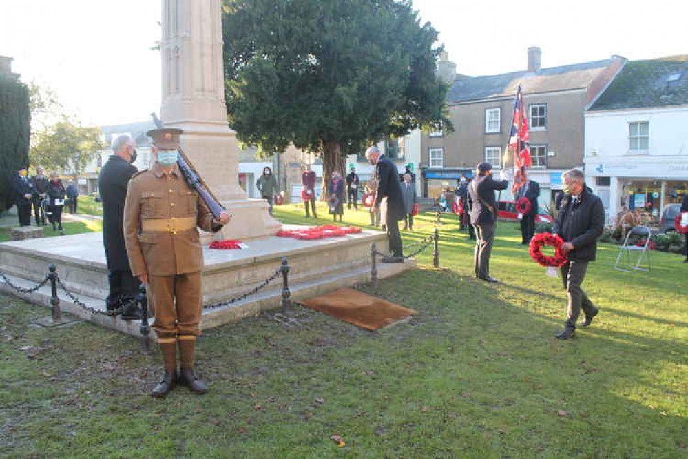 Councillor Ian Hall lays a wreath on behalf of Devon County Council