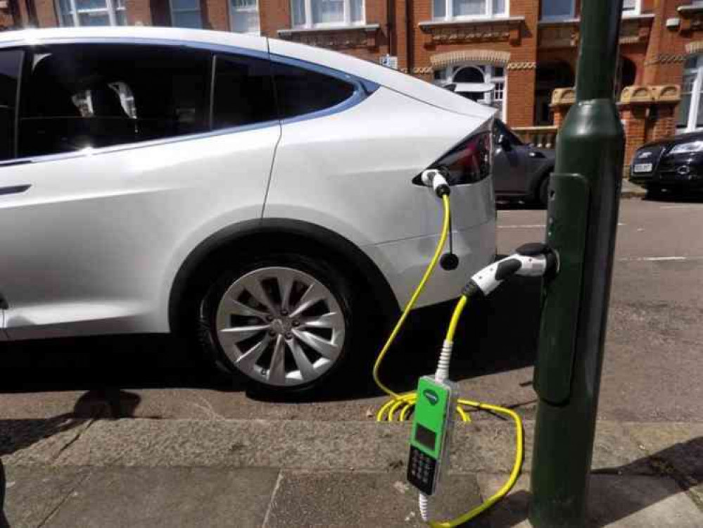 An electric car being charged.