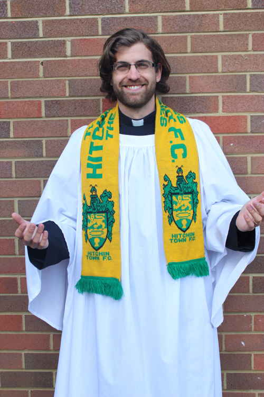 The Reverend Nick Smith, vicar of St Marks Church - a wayward goal kick from Top Field - has now also been appointed chaplain for Hitchin Town FC