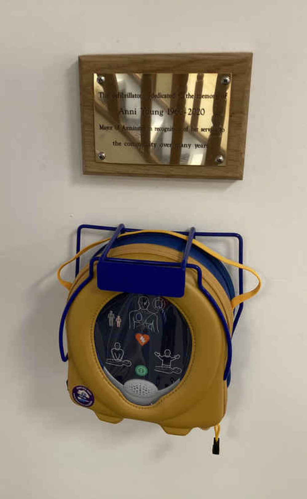 The defibrillator and plaque dedicated to Anni Young's memory at Trinity House (photo by Paul Hayward) The defibrillator and plaque dedicated to Anni Young's memory at Trinity House (photo by Paul Hayward)